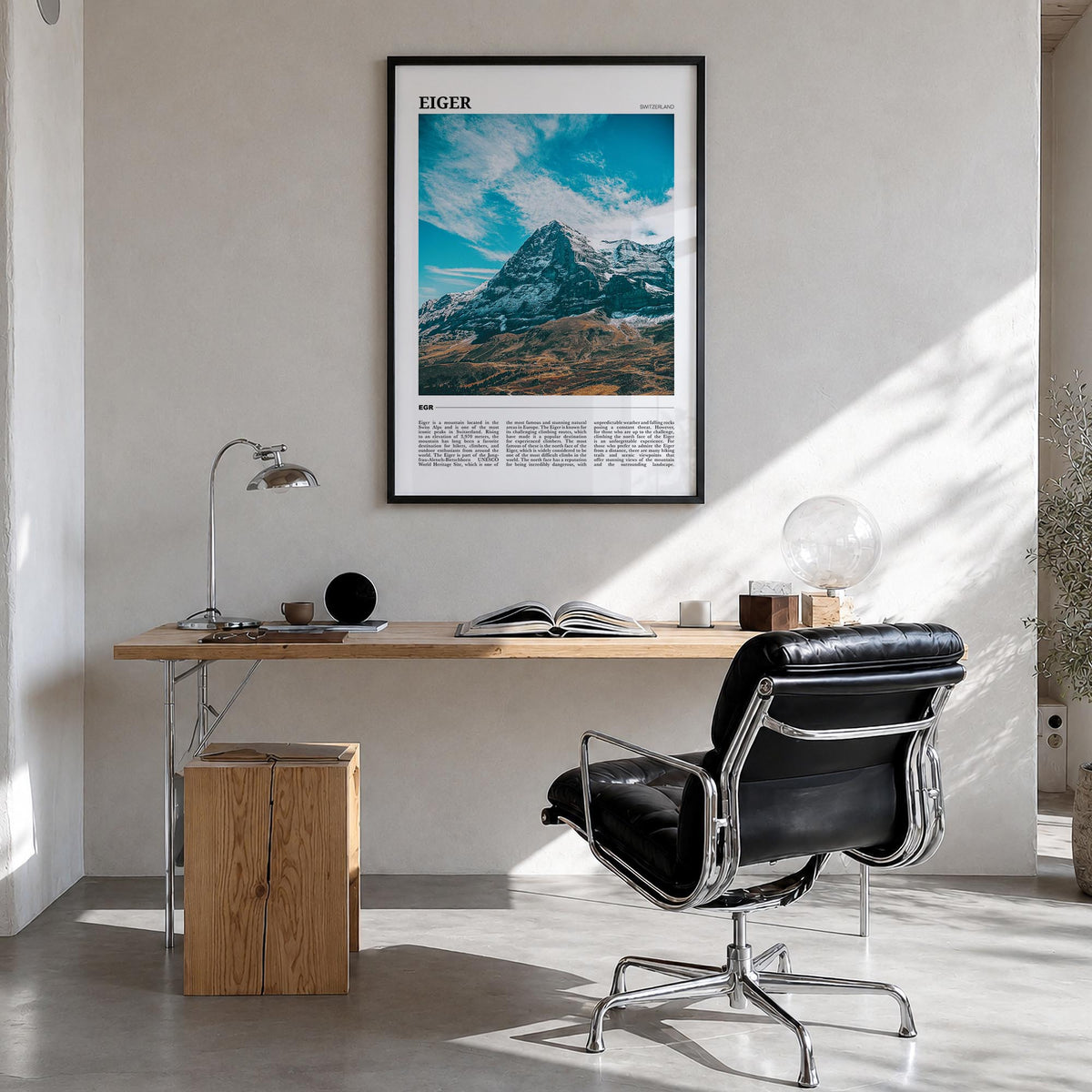 Eiger colorful travel poster of Switzerland – vertical wall art in black wood frame, hanging on wall