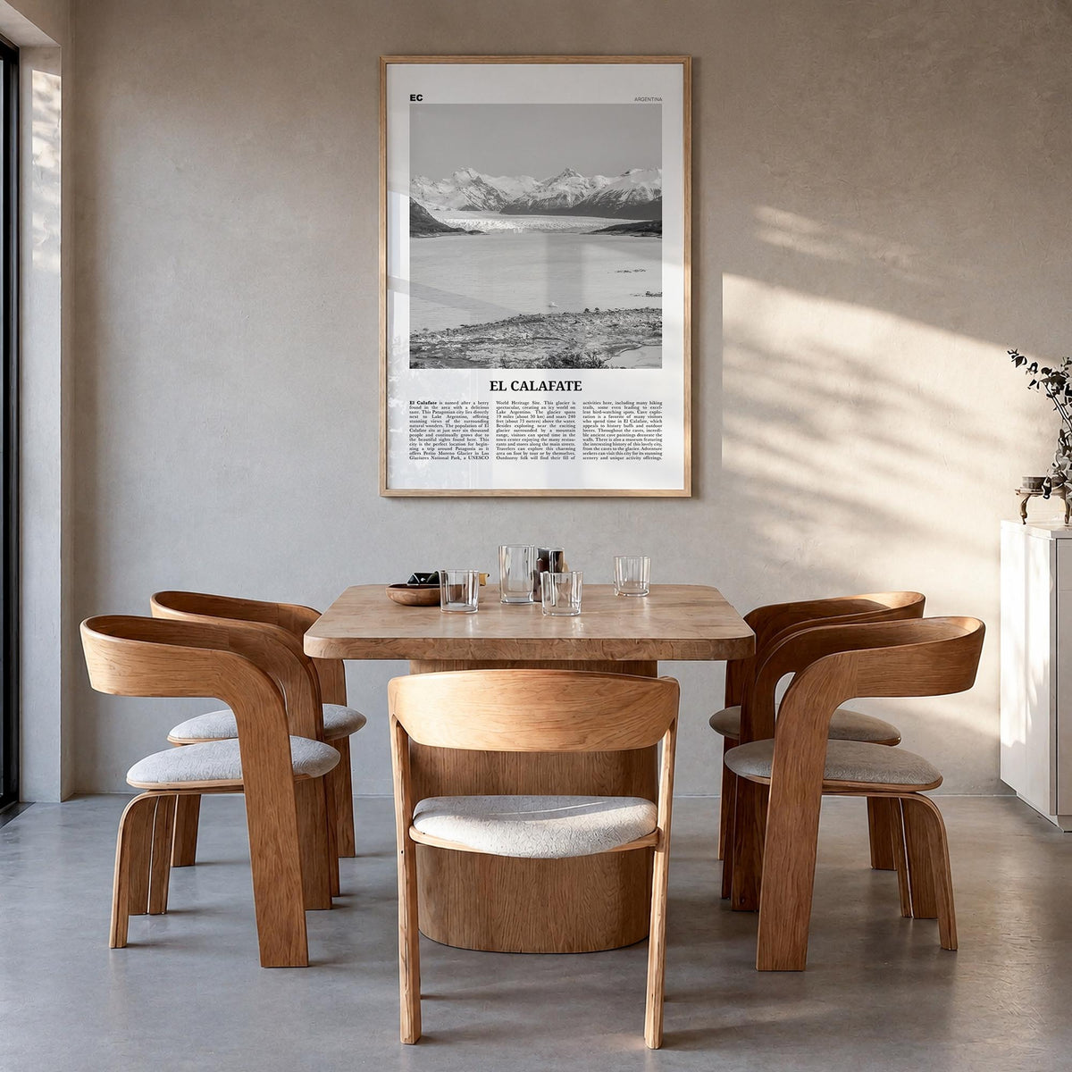 El Calafate black & white newspaper poster of Argentina – vertical wall art in natural wood frame, hanging on wall