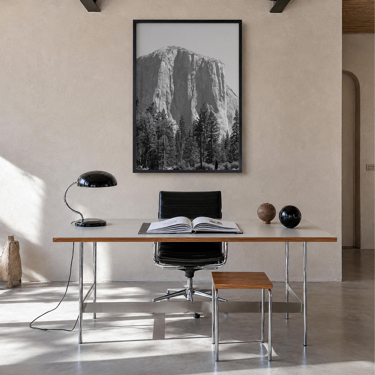 El Capitan black & white photo poster of Yosemite, California – vertical wall art in black wood frame, hanging on wall