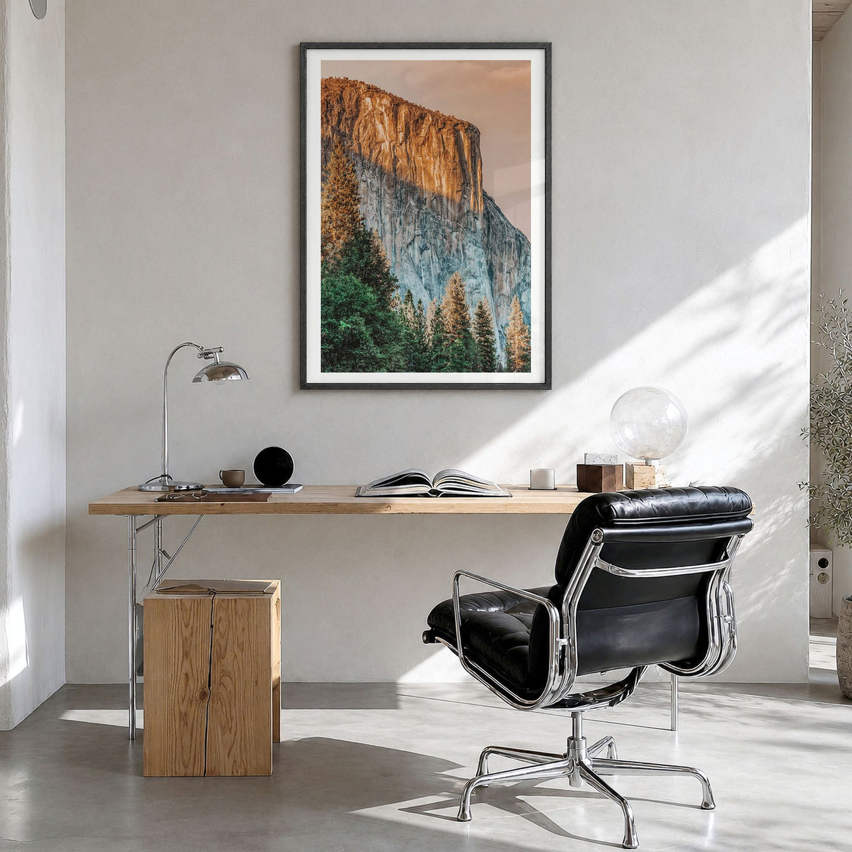 El Capitan Photo Poster in a black wood frame, hanging in a bright home office, white border