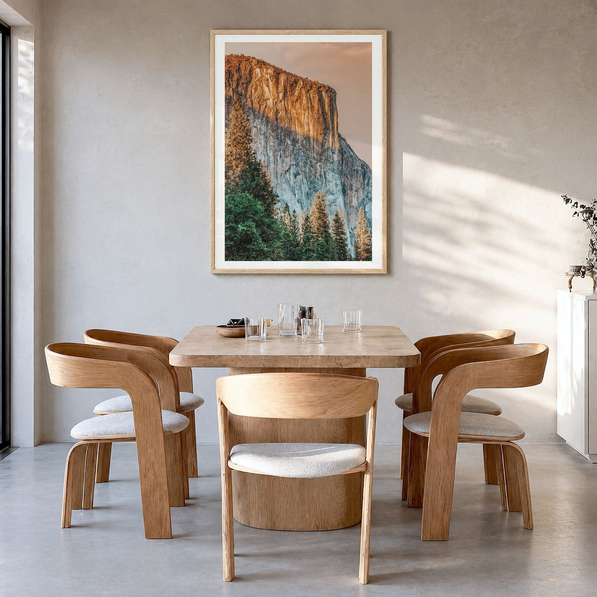 El Capitan Photo Poster in a natural wood frame, hanging in a dining room, white border