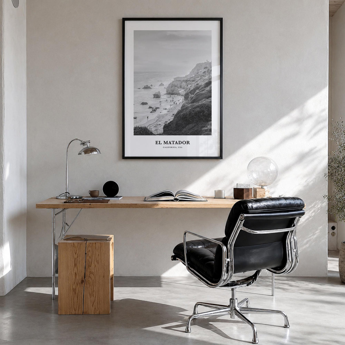 El Matador black & white classic poster of California, USA – vertical wall art in black wood frame, hanging on wall