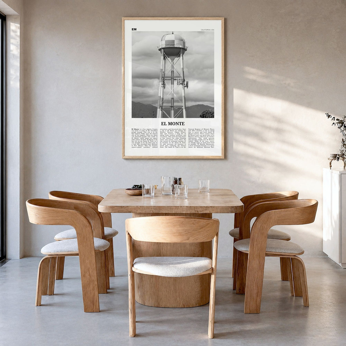 El Monte Newspaper No 2 Poster in a natural wood frame, hanging in a dining room