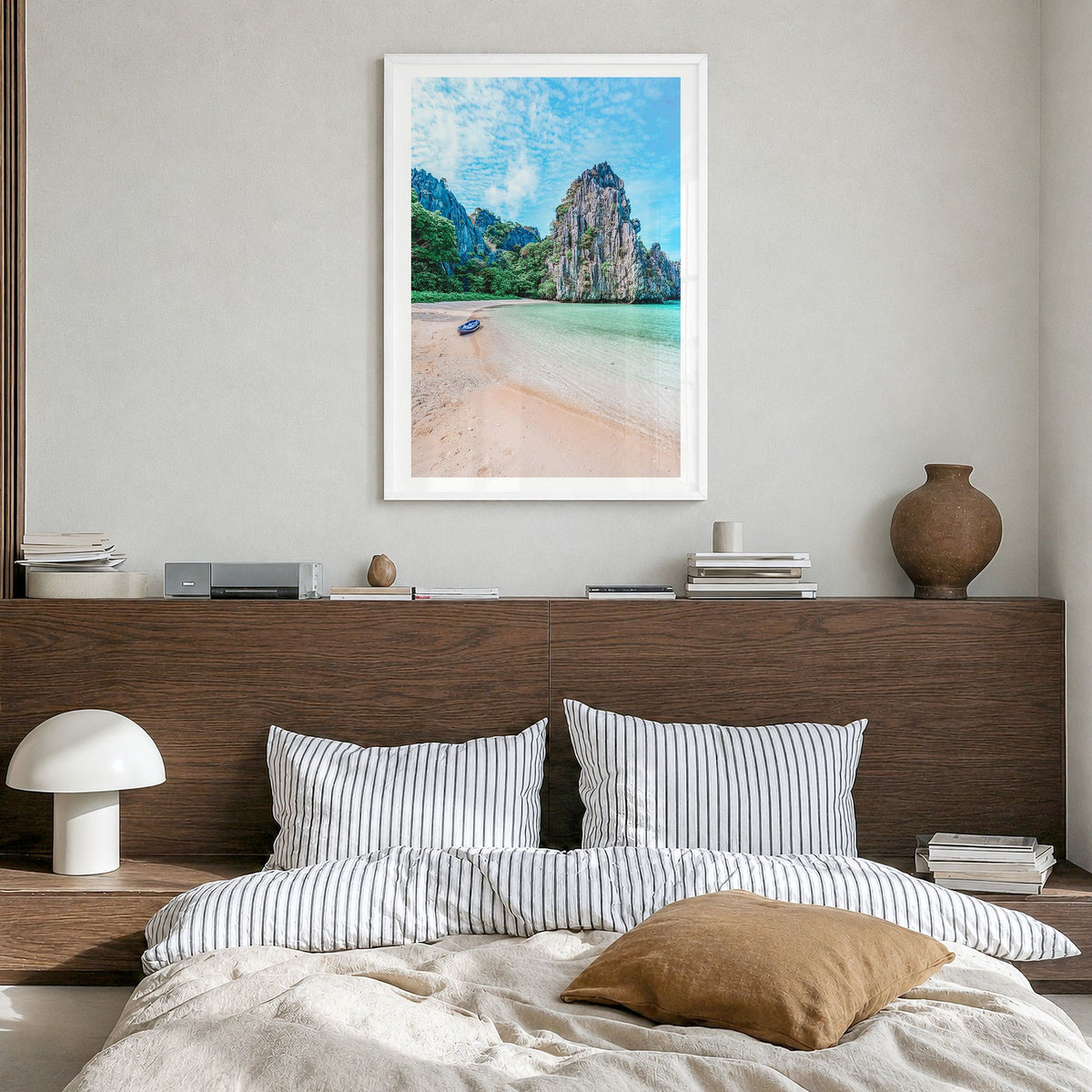 El Nido Photo Poster in a white wood frame, hanging in a bedroom, white border