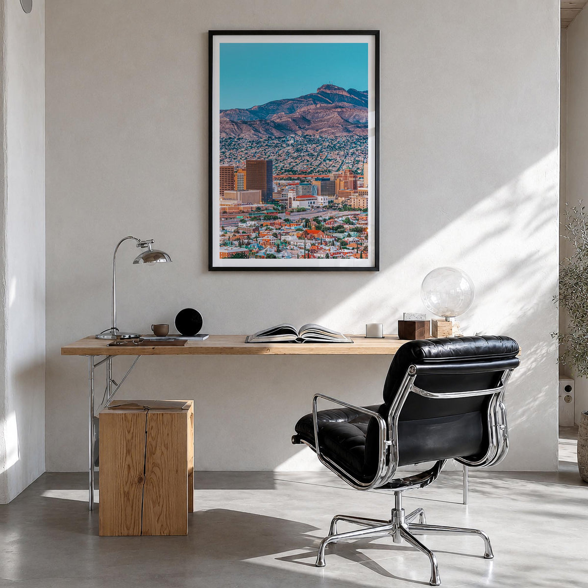 El Paso colorful photo poster of Texas, USA – vertical wall art in black wood frame with white border, hanging on wall