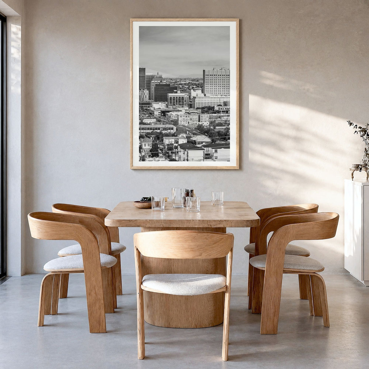 El Paso Photo Poster in a natural wood frame, hanging in a dining room, white border