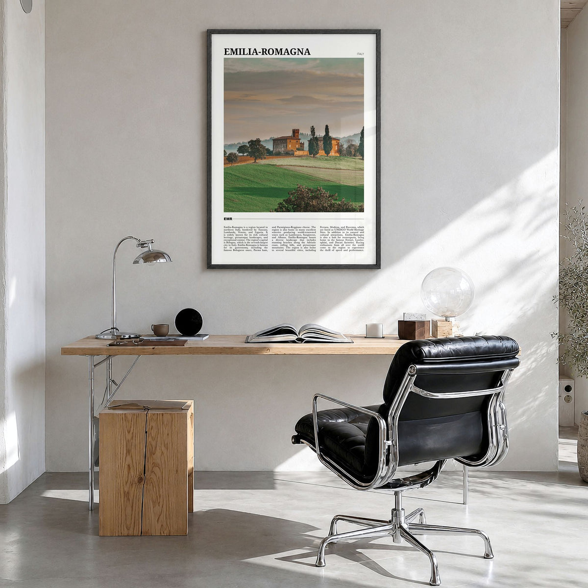 Emilia-Romagna Travel Poster in a black wood frame, hanging in a bright home office