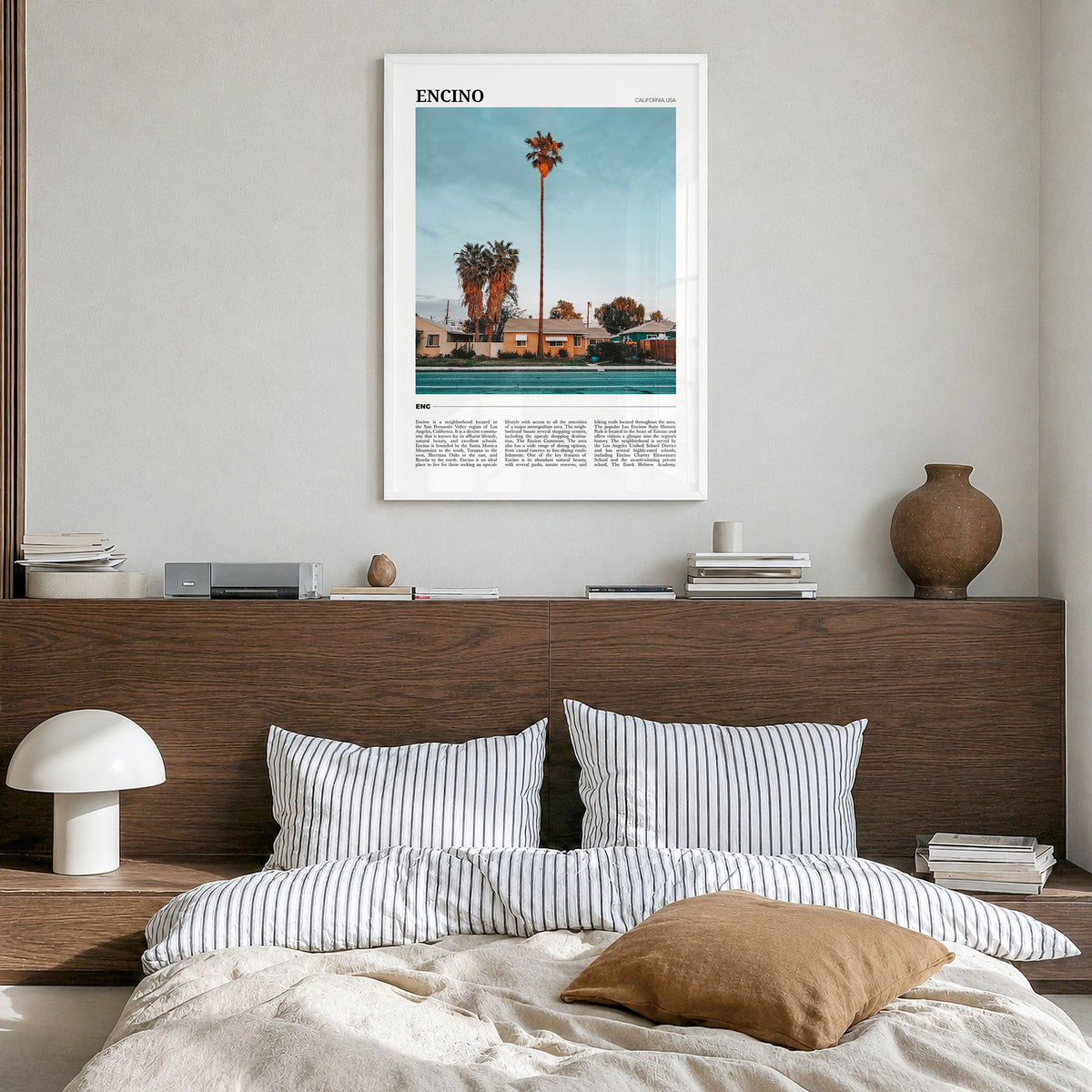 Encino Travel Poster in a white wood frame, hanging in a bedroom