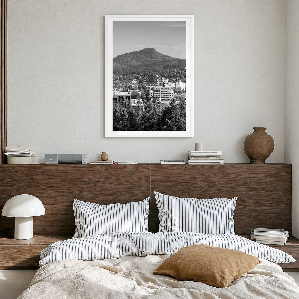 Eugene Photo Poster in a white wood frame, hanging in a bedroom, white border