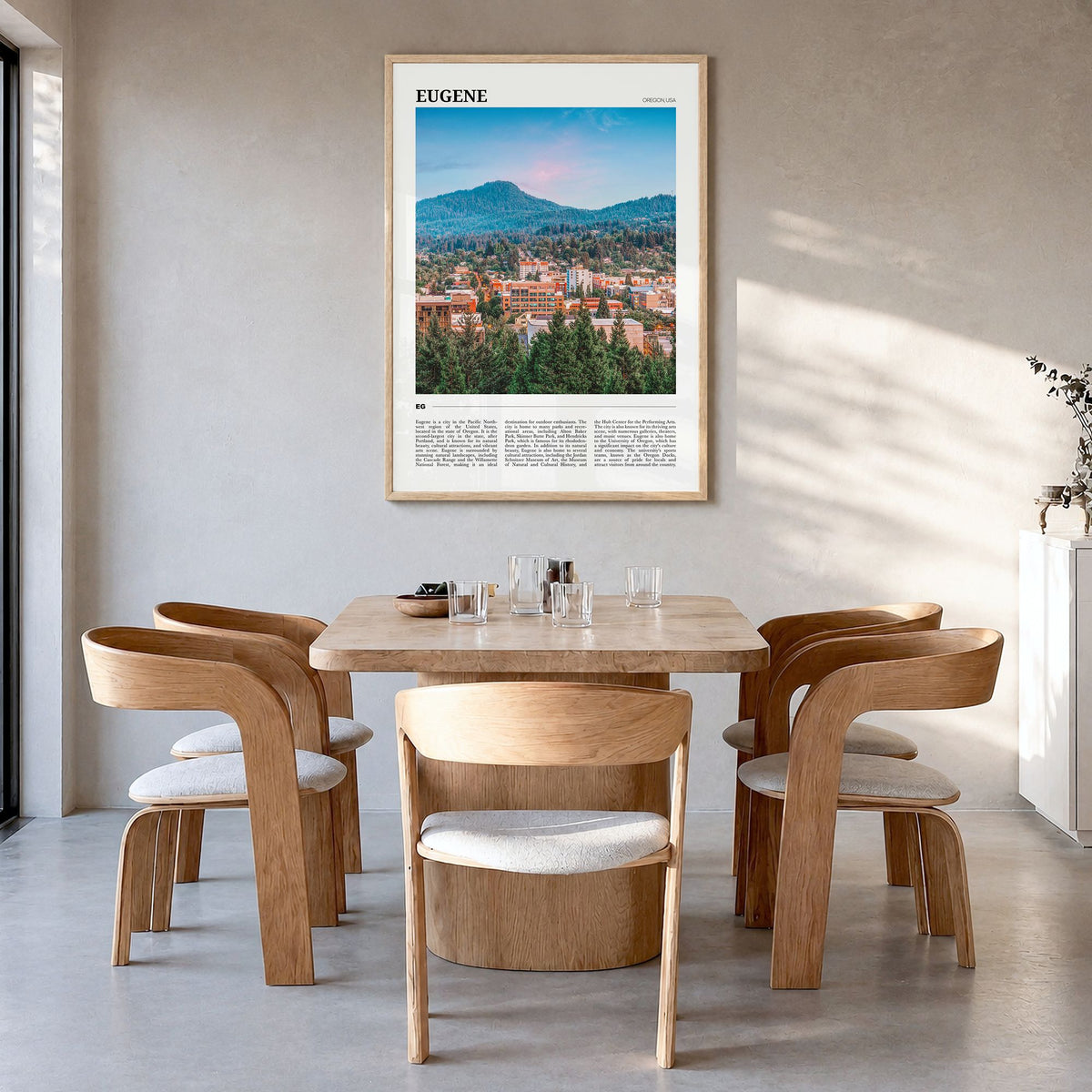 Eugene Travel Poster in a natural wood frame, hanging in a dining room