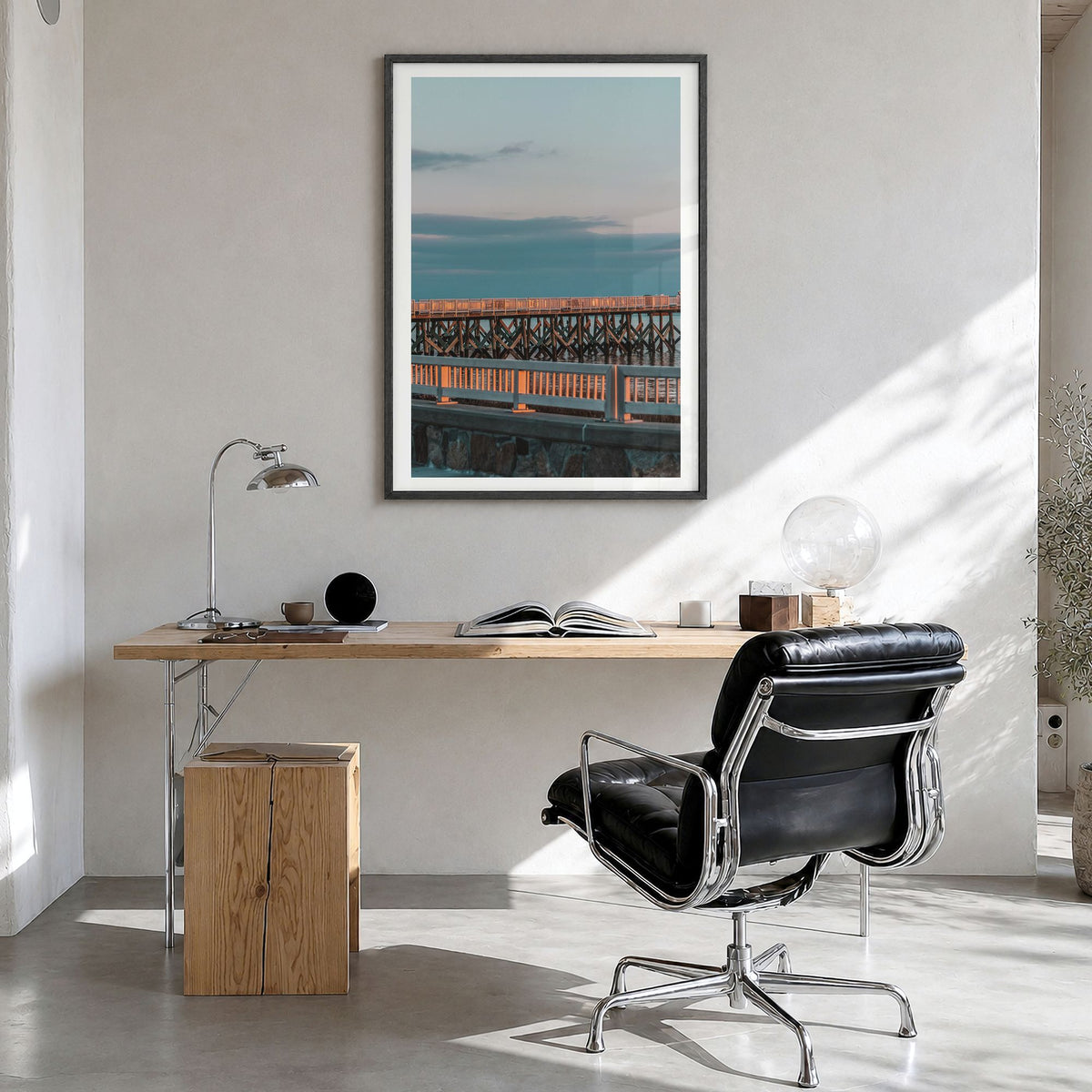 Fairfield Photo Poster in a black wood frame, hanging in a bright home office, white border