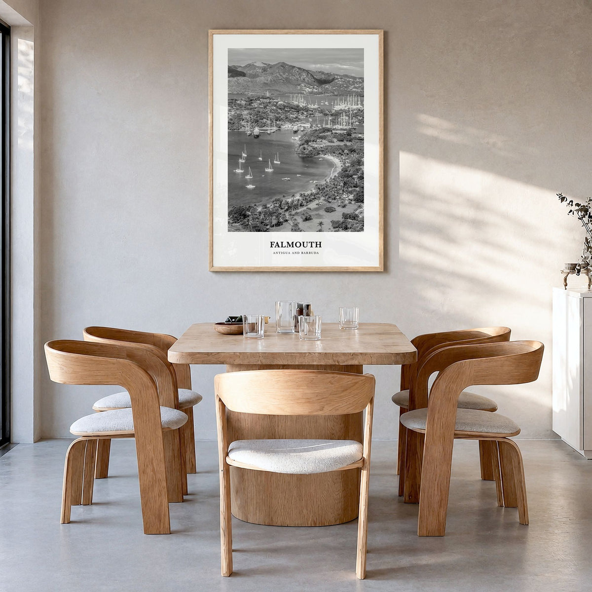 Falmouth, Antigua and Barbuda Classic Poster in a natural wood frame, hanging in a dining room