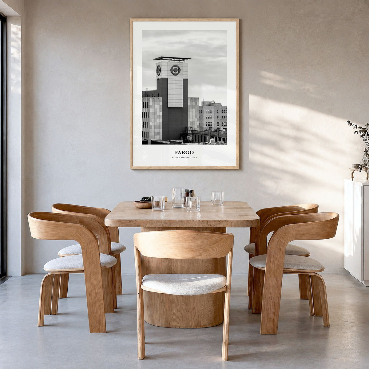 Fargo Classic No 3 Poster in a natural wood frame, hanging in a dining room