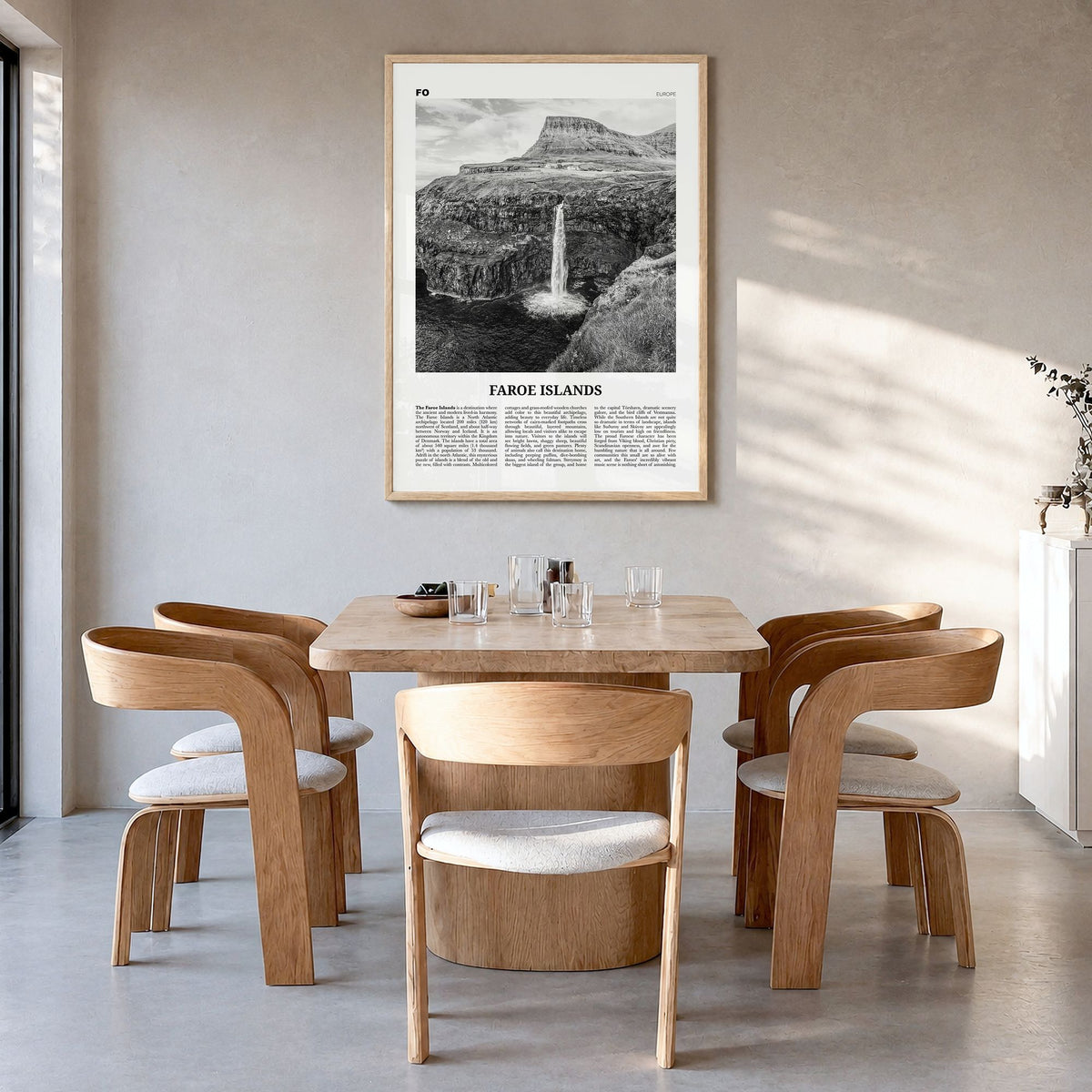 Faroe Islands Newspaper Poster in a natural wood frame, hanging in a dining room