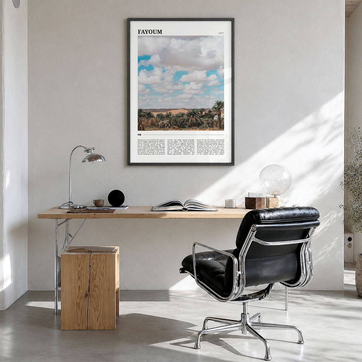 Fayoum Travel Poster in a black wood frame, hanging in a bright home office