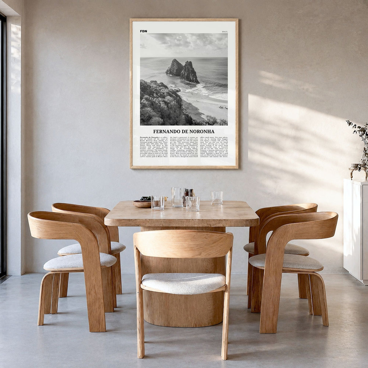 Fernando de Noronha Newspaper Poster in a natural wood frame, hanging in a dining room