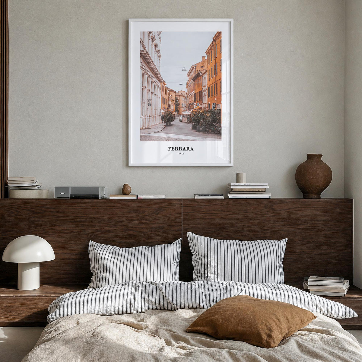 Ferrara colorful classic poster of Italy – vertical wall art in white wood frame, hanging on wall