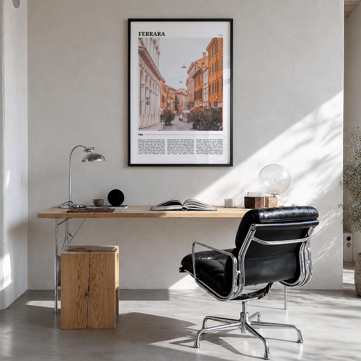 Ferrara colorful travel poster of Italy – vertical wall art in black wood frame, hanging on wall