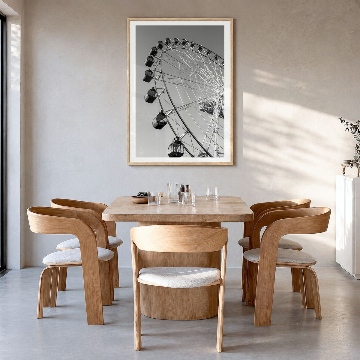 Ferris Wheel Photo Poster in a natural wood frame, hanging in a dining room, white border