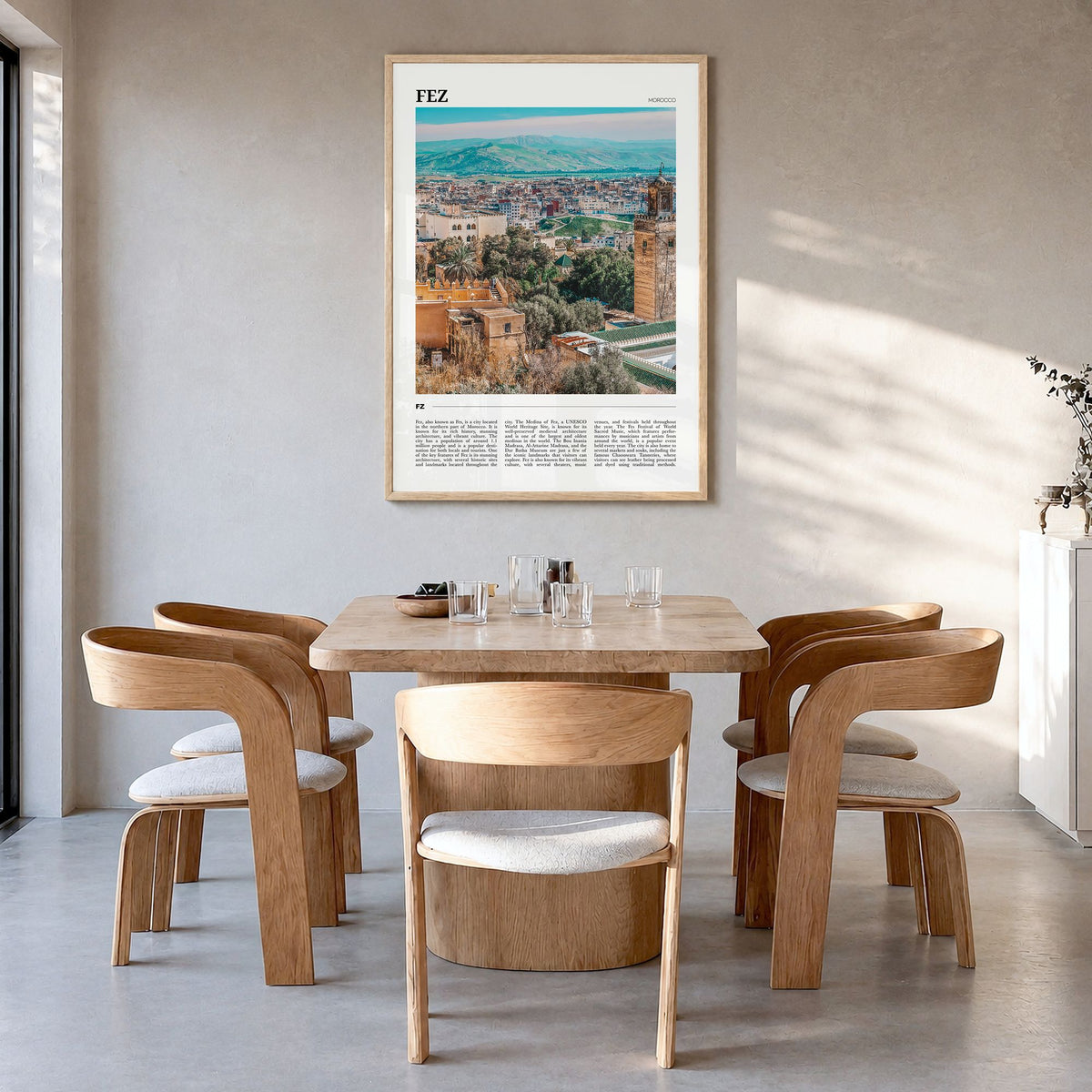 Fez Travel Poster in a natural wood frame, hanging in a dining room