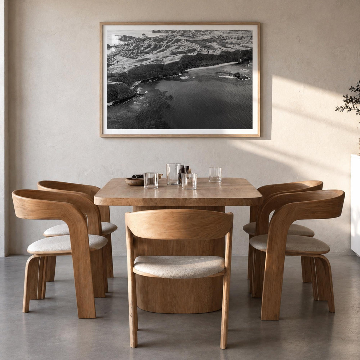Fiji black & white photo poster of Oceania – horizontal wall art in natural wood frame with white border, hanging on wall