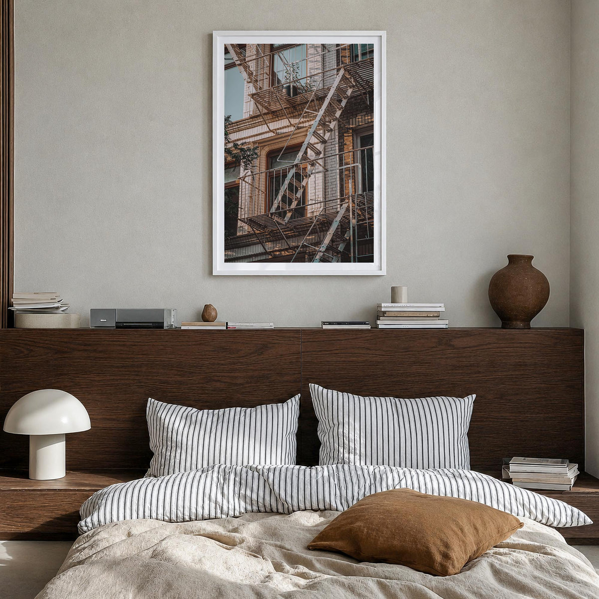 Fire Escapes no. 1 colorful photo poster – vertical wall art in white wood frame with white border, hanging on wall