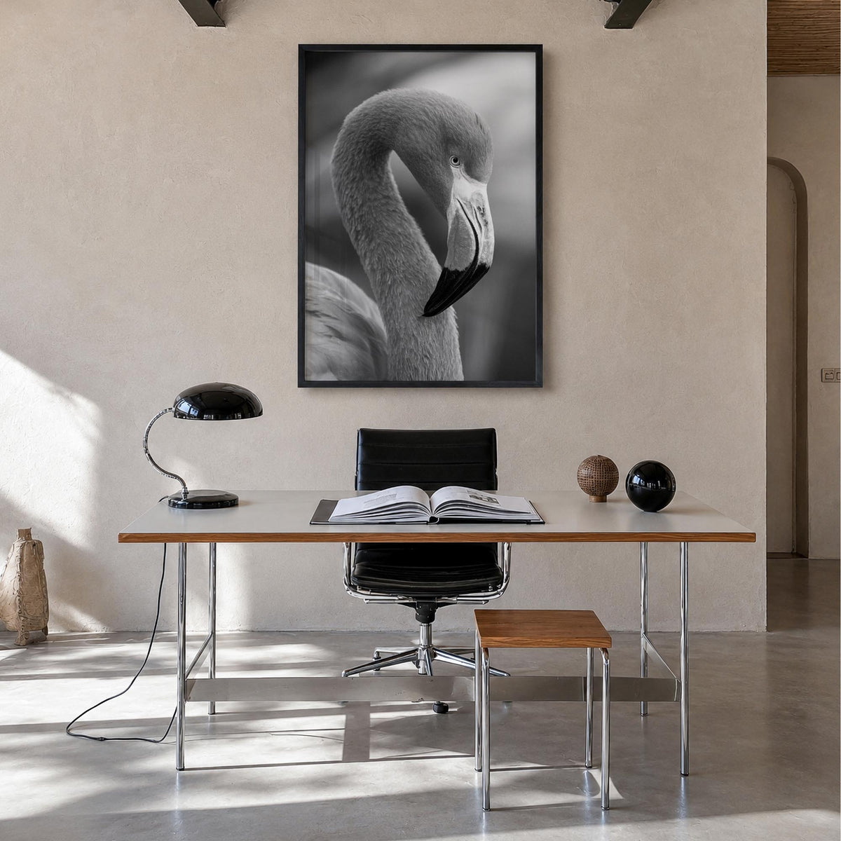 Flamingo black & white photo poster – vertical wall art in black wood frame, hanging on wall