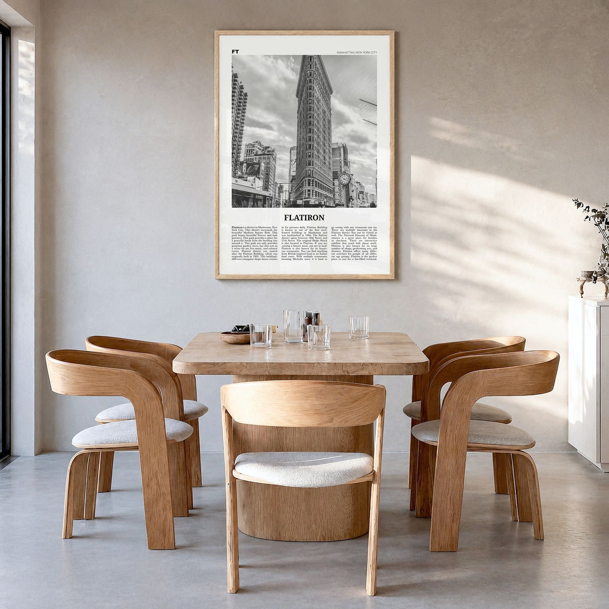 Flatiron Newspaper Poster in a natural wood frame, hanging in a dining room