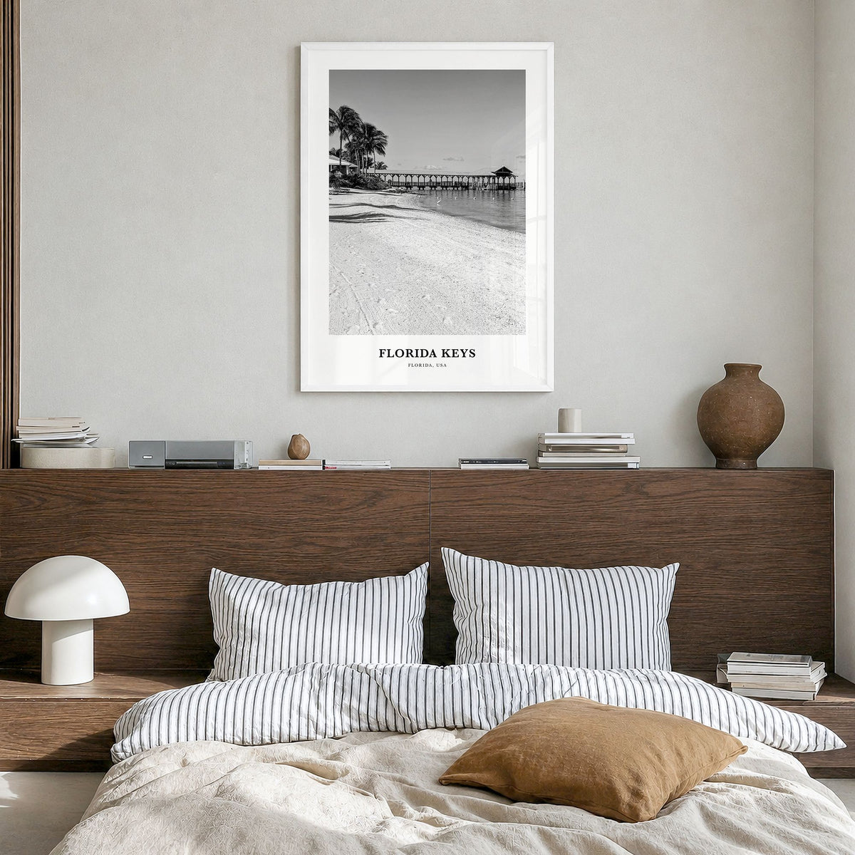 Florida Keys Classic Poster in a white wood frame, hanging in a bedroom