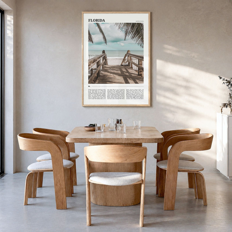 Florida Travel Poster in a natural wood frame, hanging in a dining room