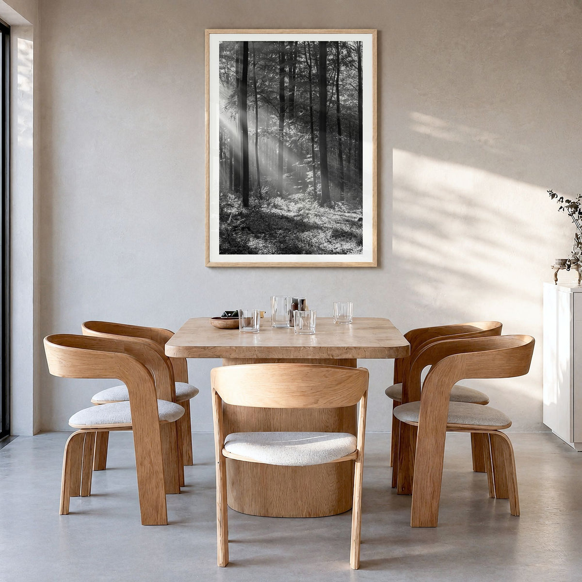 Forest Photo Poster in a natural wood frame, hanging in a dining room, white border