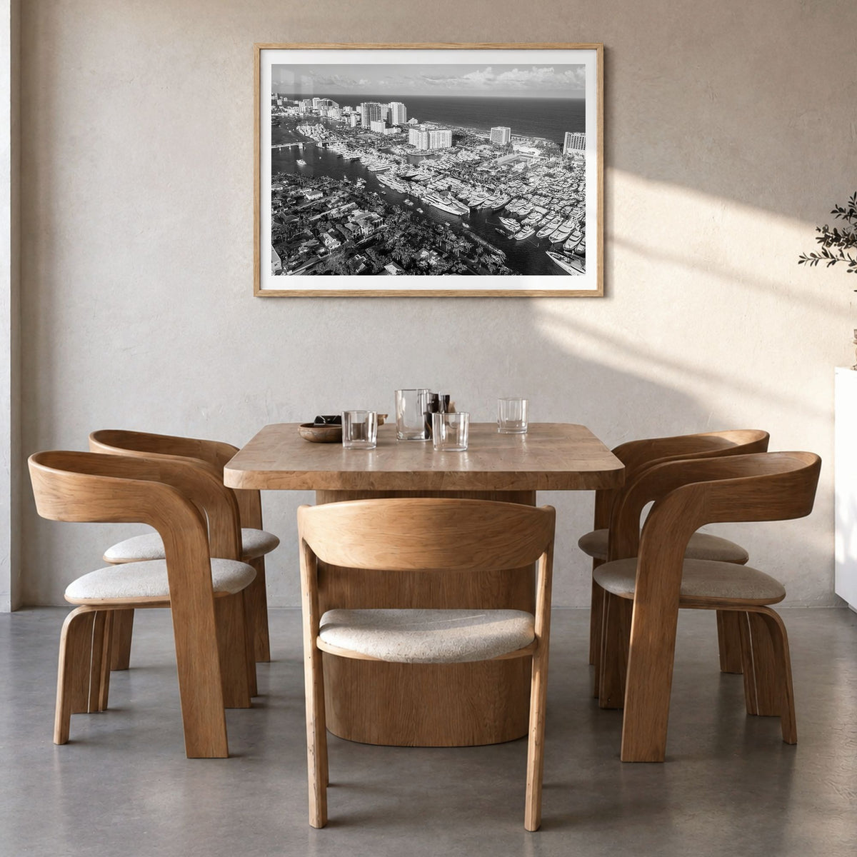 Fort Lauderdale Photo Poster in a natural wood frame, hanging in a dining room, white border