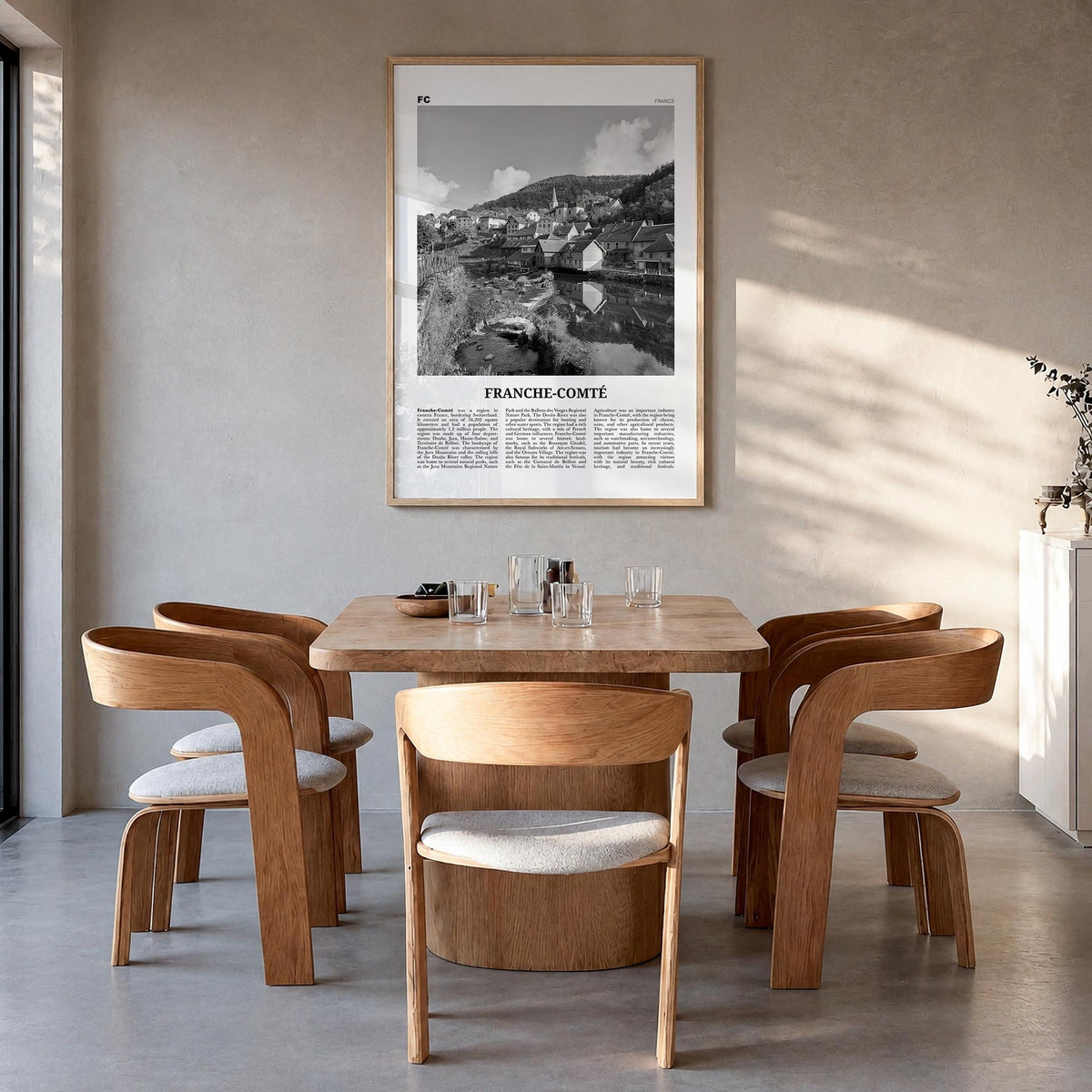 Franche-Comté black & white newspaper poster of France – vertical wall art in natural wood frame, hanging on wall