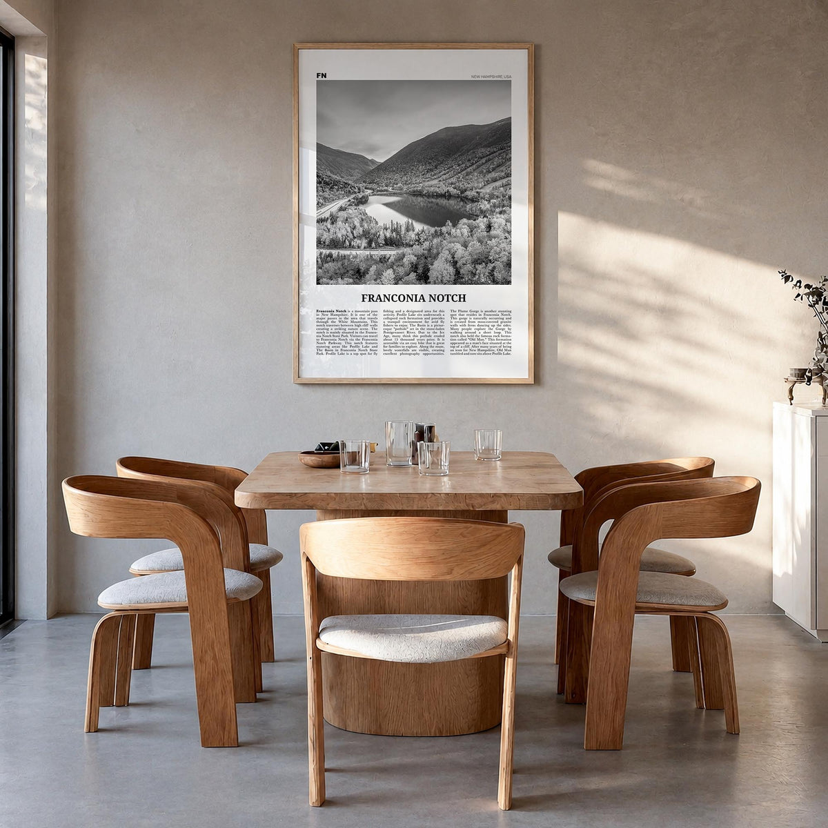 Franconia Notch black & white newspaper poster of New Hampshire, USA – vertical wall art in natural wood frame, hanging on wa