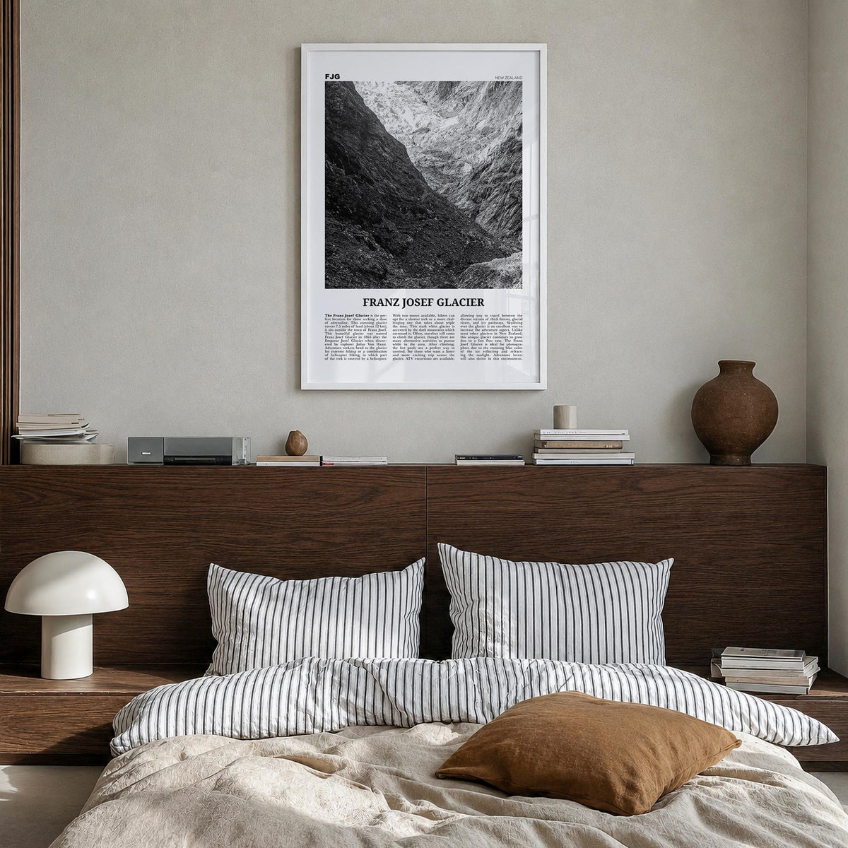 Franz Josef Glacier black & white newspaper poster of New Zealand – vertical wall art in white wood frame, hanging on wall