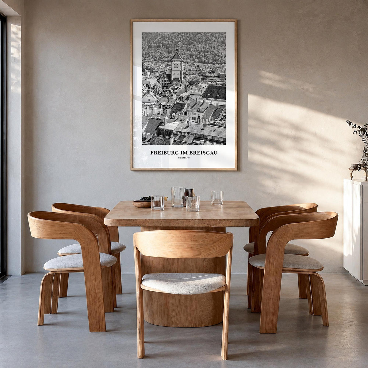 Freiburg im Breisgau black & white classic poster of Germany – vertical wall art in natural wood frame, hanging on wall