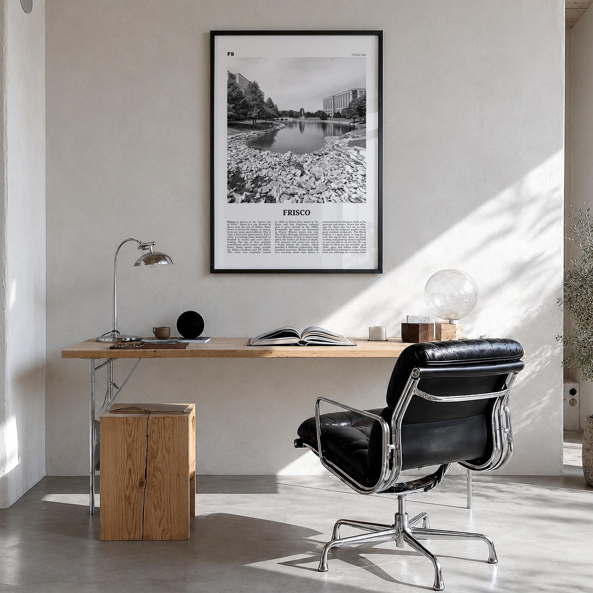 Frisco black & white newspaper poster of Texas, USA – vertical wall art in black wood frame, hanging on wall