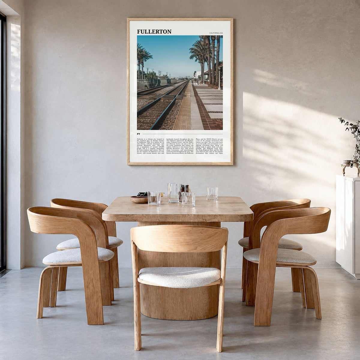 Fullerton Travel Poster in a natural wood frame, hanging in a dining room