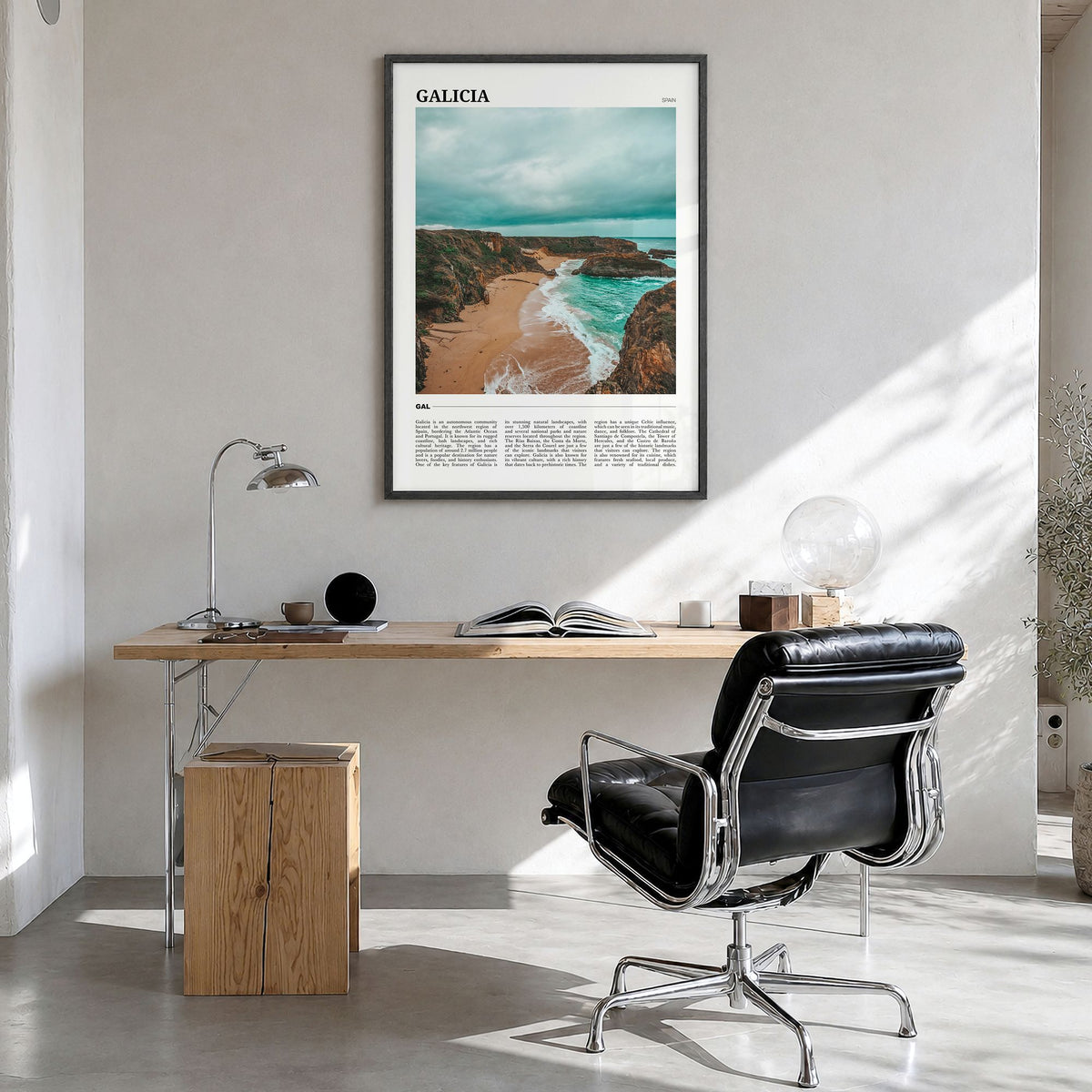 Galicia Travel Poster in a black wood frame, hanging in a bright home office