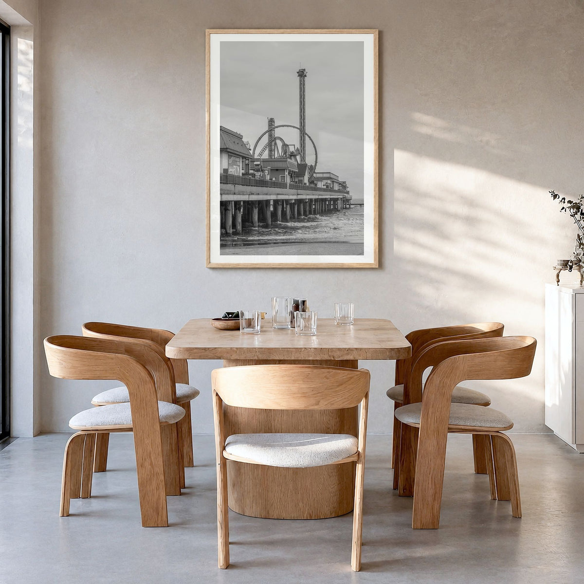 Galveston Photo Poster in a natural wood frame, hanging in a dining room, white border