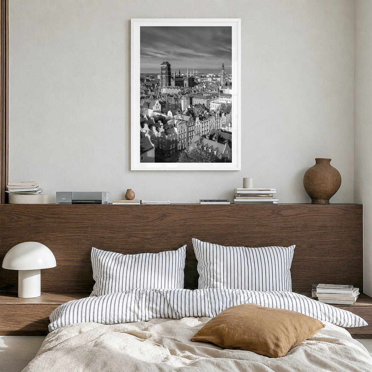 Gdańsk Photo Poster in a white wood frame, hanging in a bedroom, white border