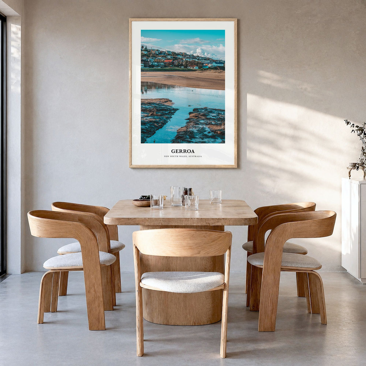 Gerroa Classic Poster in a natural wood frame, hanging in a dining room