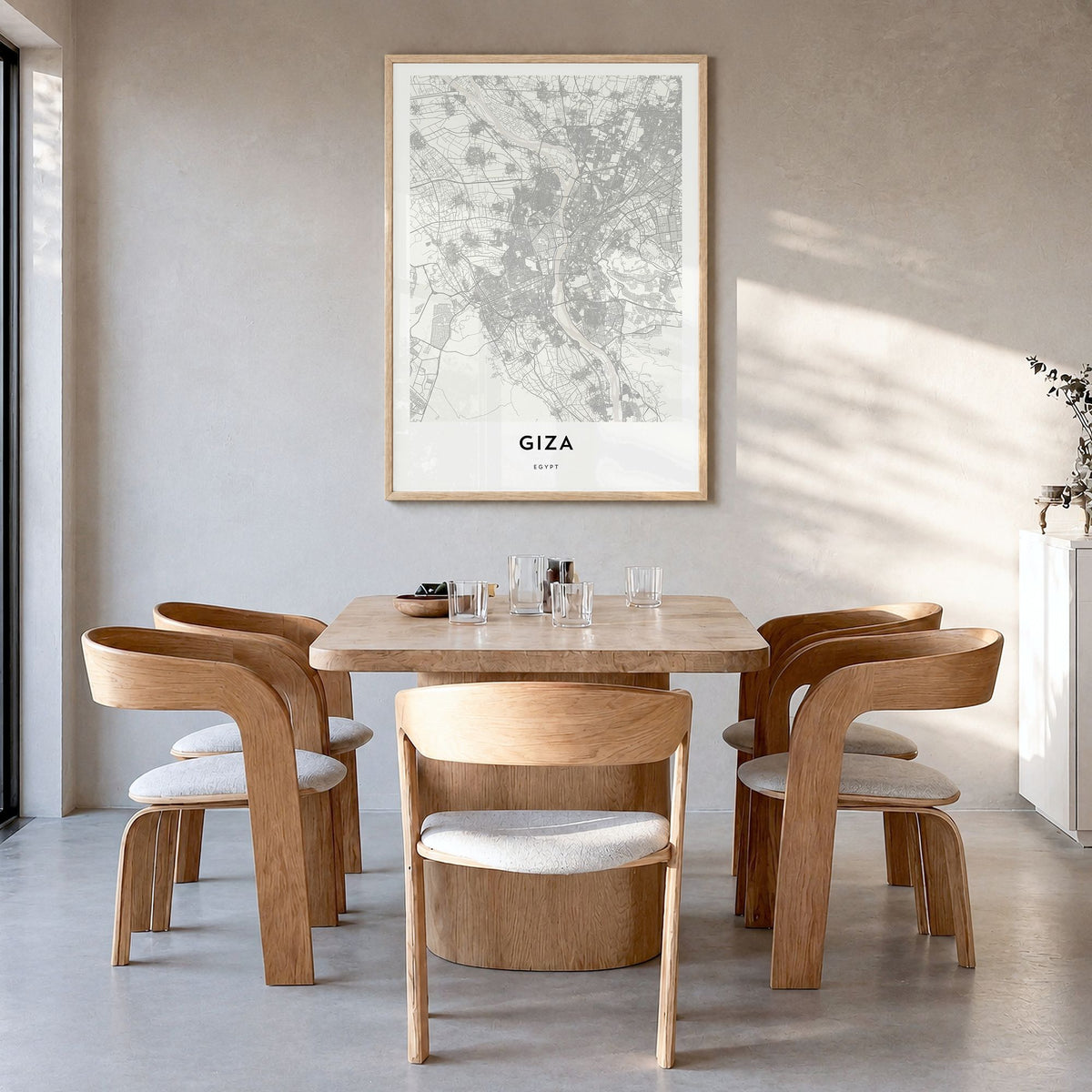 Giza Map Poster in a natural wood frame, hanging in a dining room