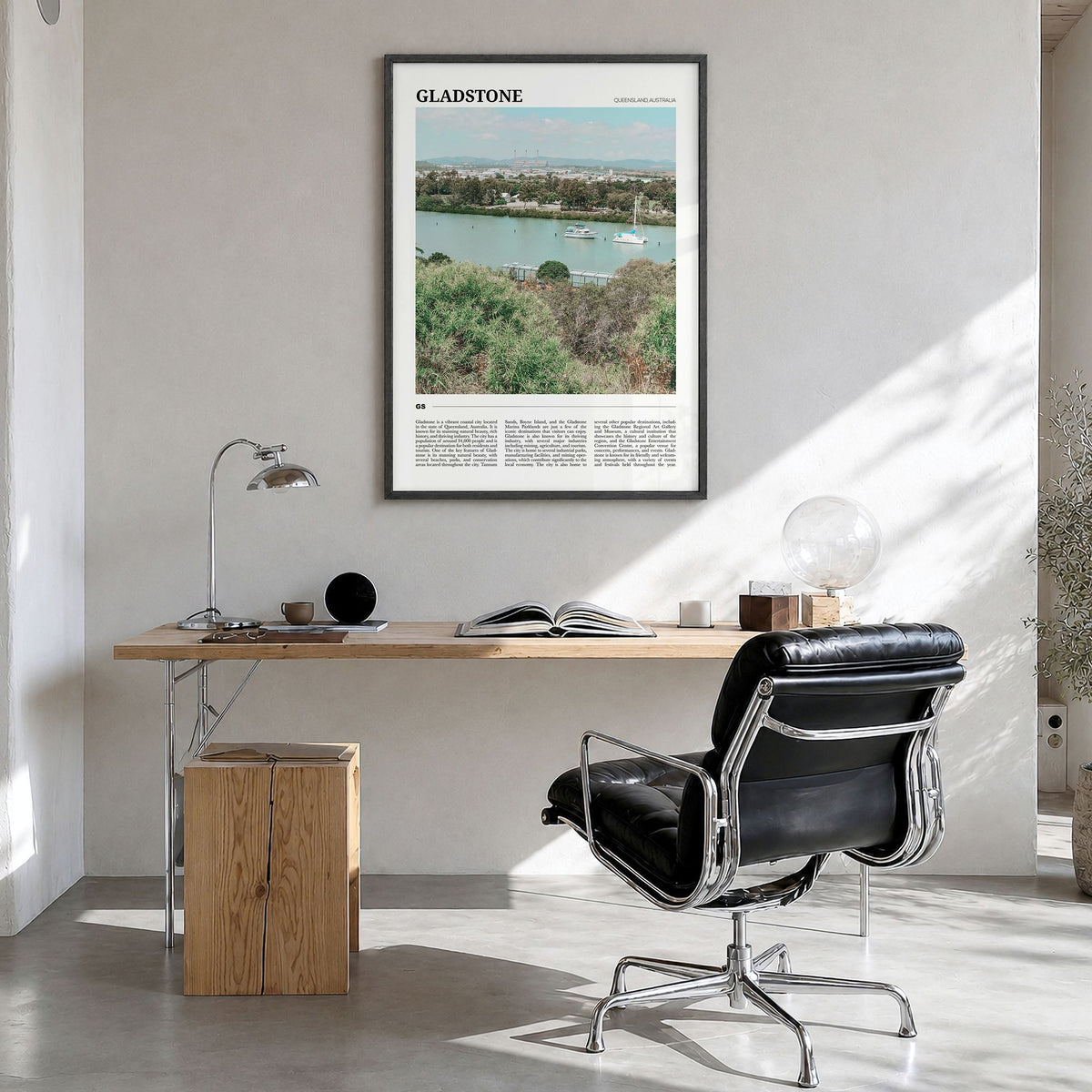 Gladstone Travel Poster in a black wood frame, hanging in a bright home office