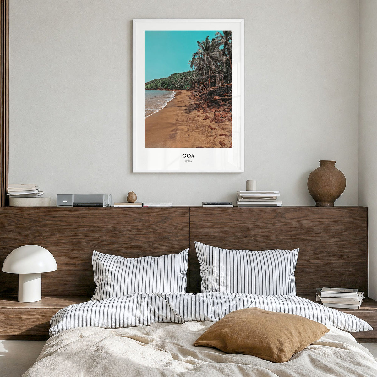 Goa Classic Poster in a white wood frame, hanging in a bedroom