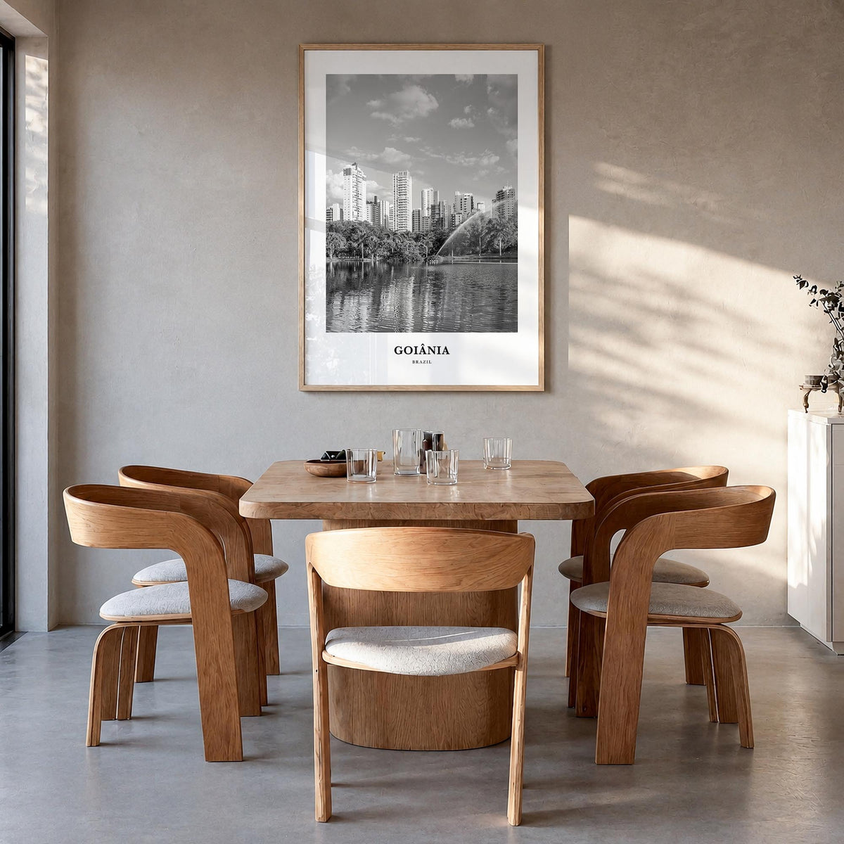 Goiânia black & white classic poster of Brazil – vertical wall art in natural wood frame, hanging on wall