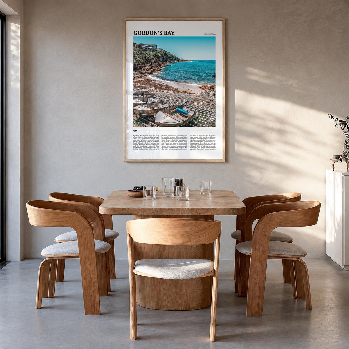 Gordon's Bay colorful travel poster of South Africa – vertical wall art in natural wood frame, hanging on wall