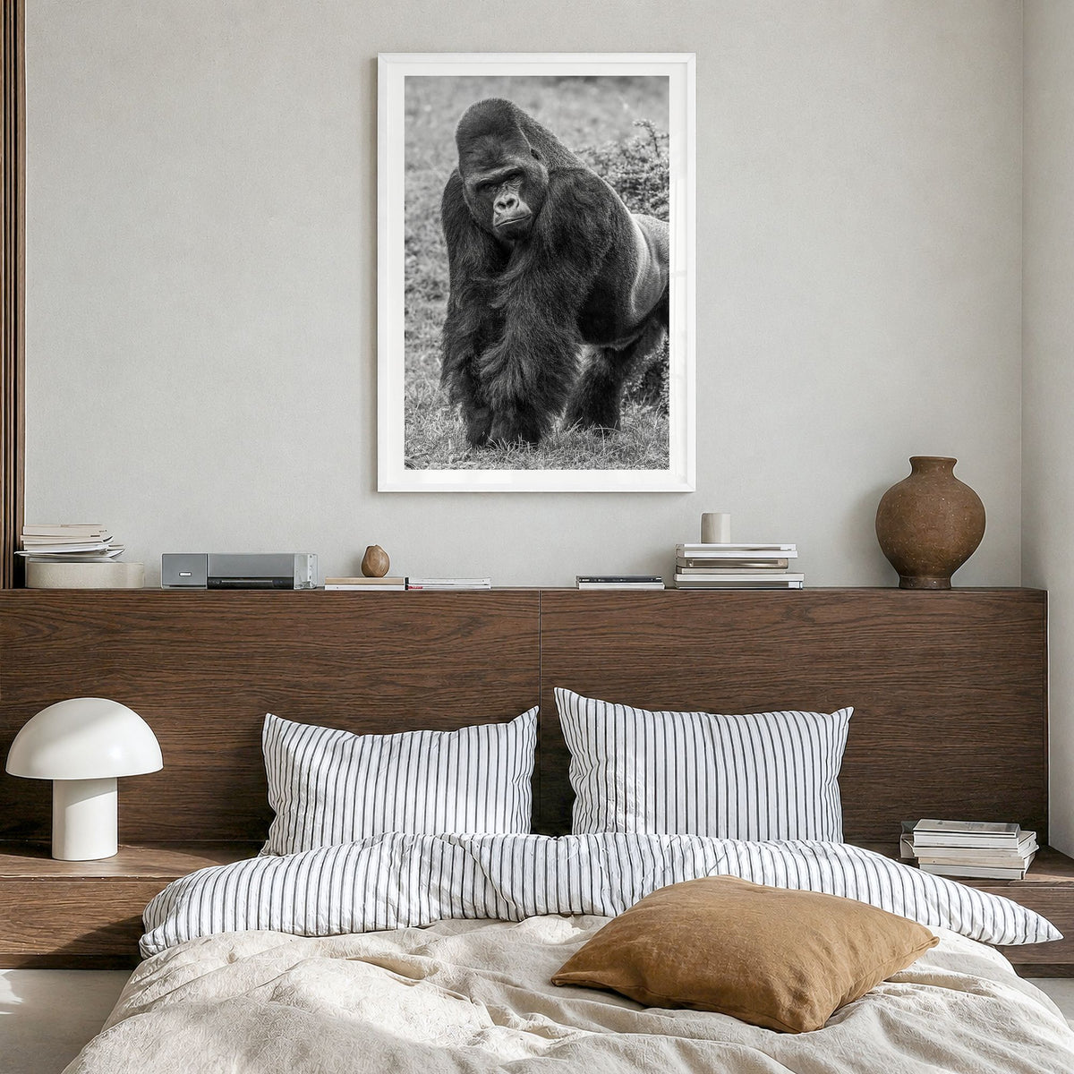 Gorilla Photo Poster in a white wood frame, hanging in a bedroom, white border
