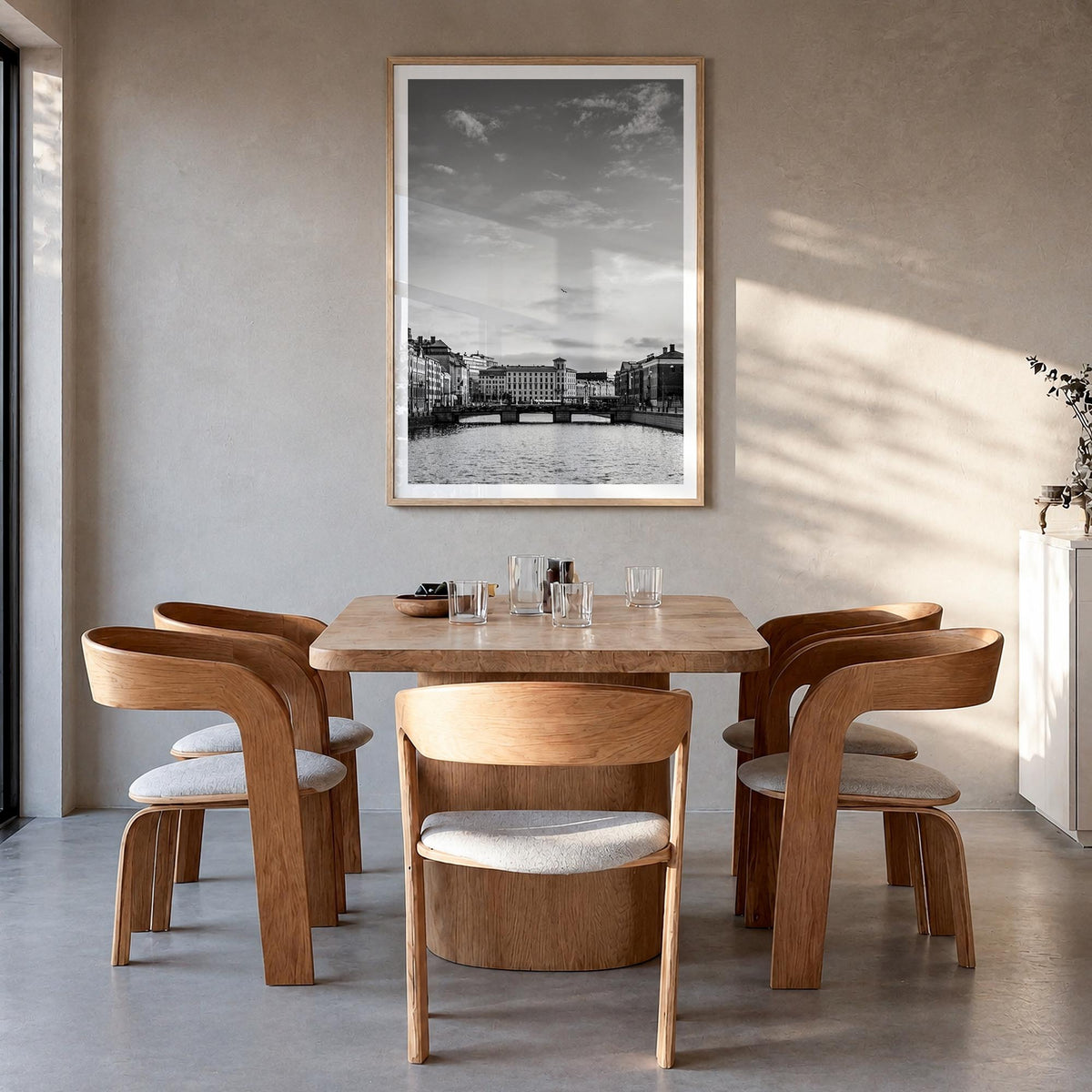 Gothenburg no. 1 black & white photo poster of Sweden – vertical wall art in natural wood frame with white border, hanging on