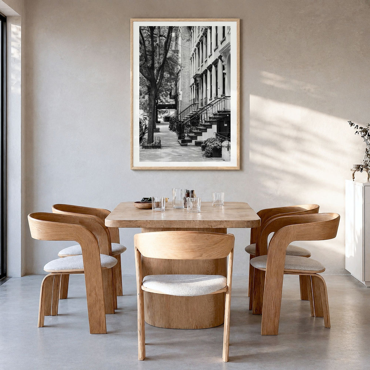 Gramercy Park Photo Poster in a natural wood frame, hanging in a dining room, white border